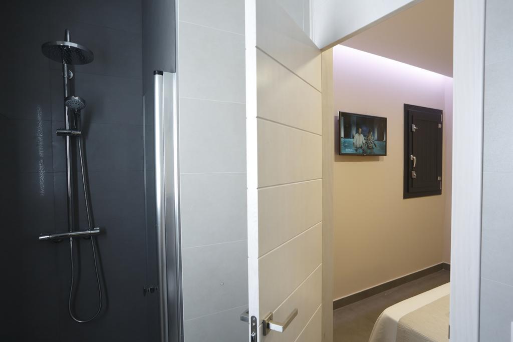 La Pasajera Hostal Boutique コニル・デ・ラ・フロンテラ エクステリア 写真
